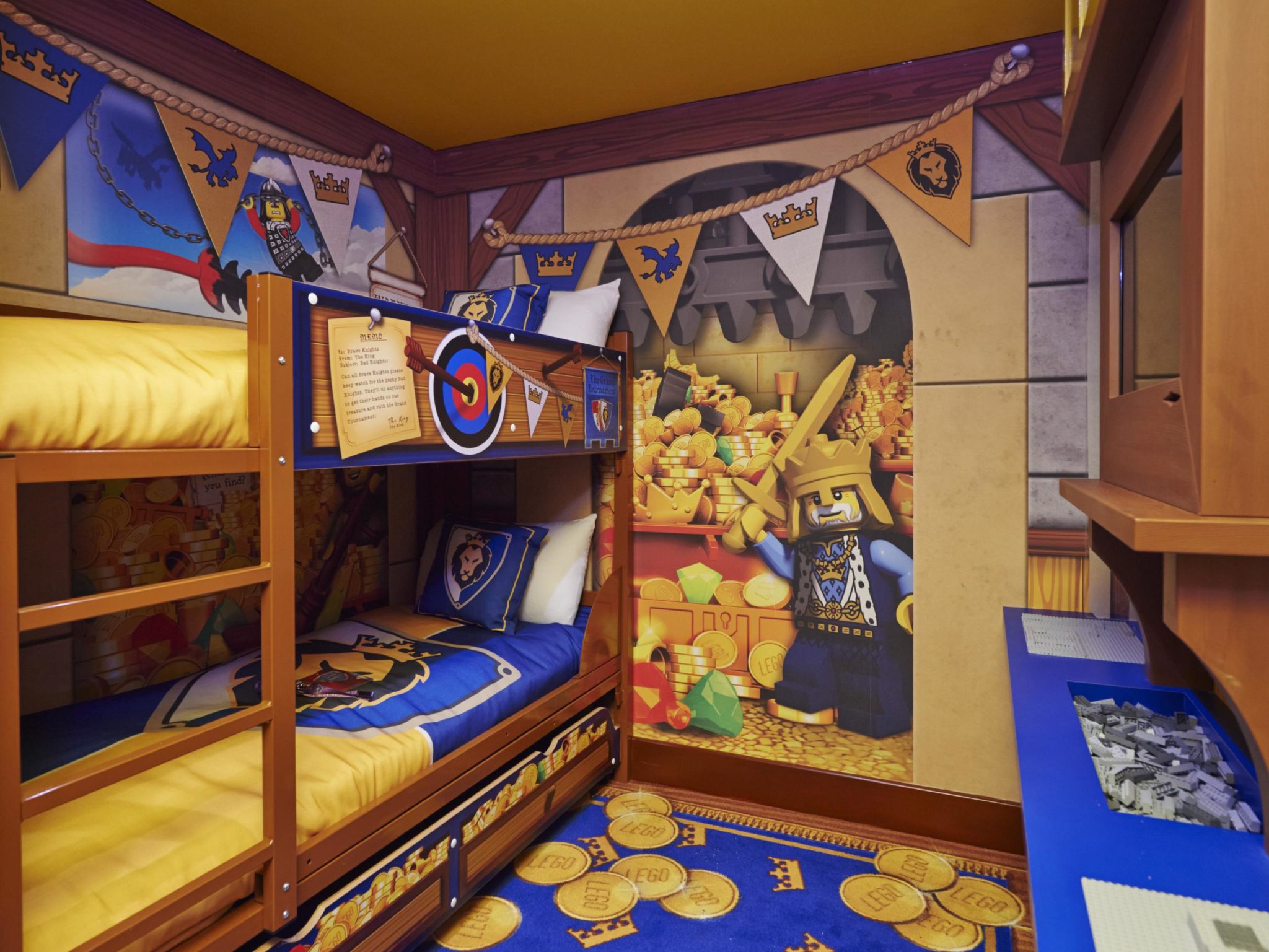 A LEGO castle themed childrens area with a bunkbed
