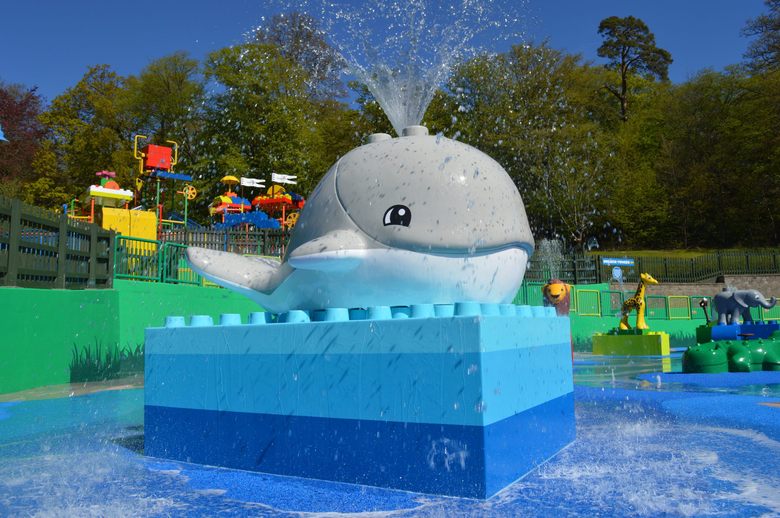 A LEGO Duplo whale squirting out water in a water themed area
