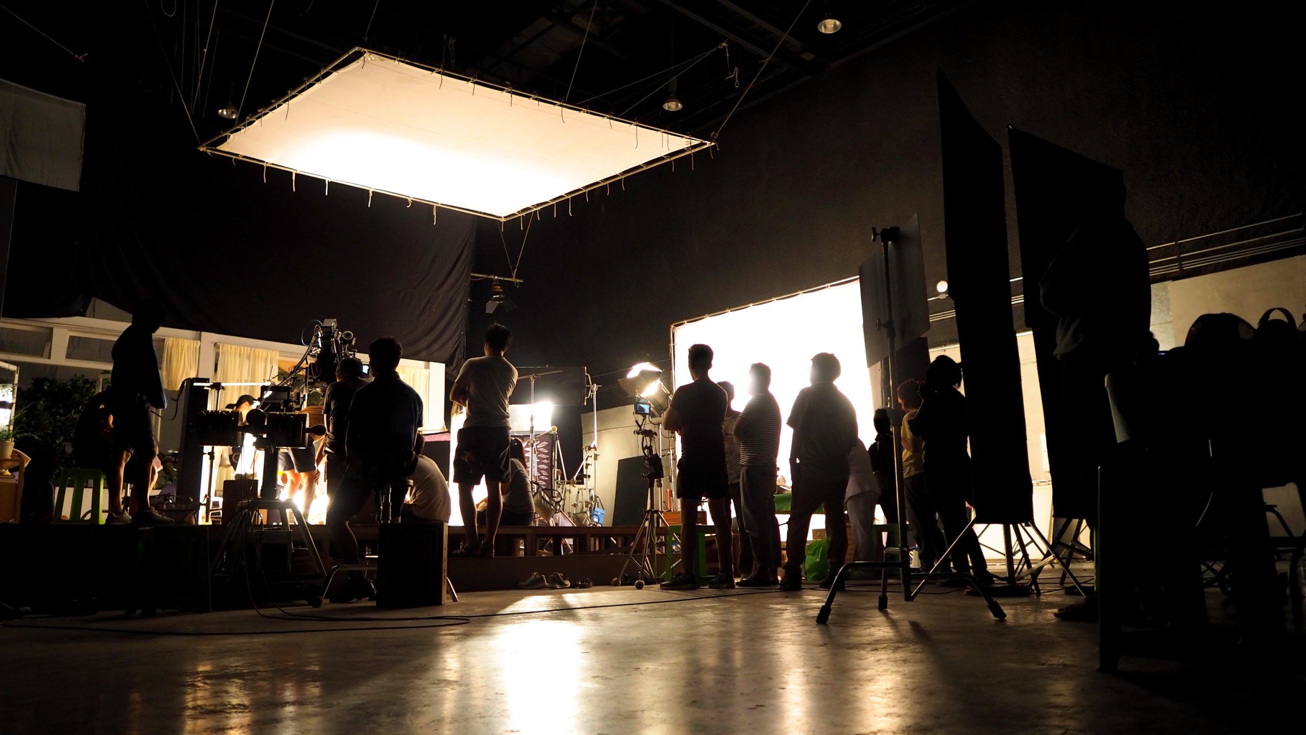 A set of a production crew filming a set