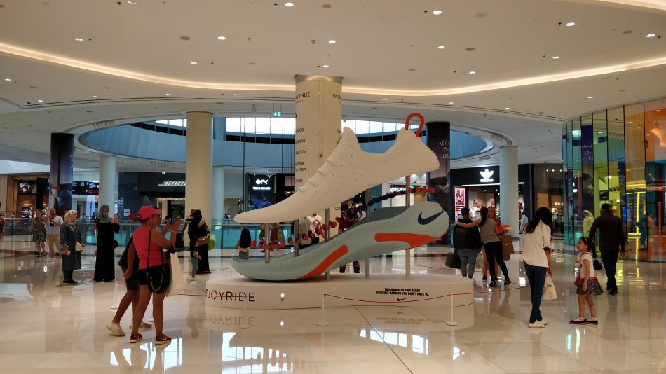 A large nike shoe in a shopping centre