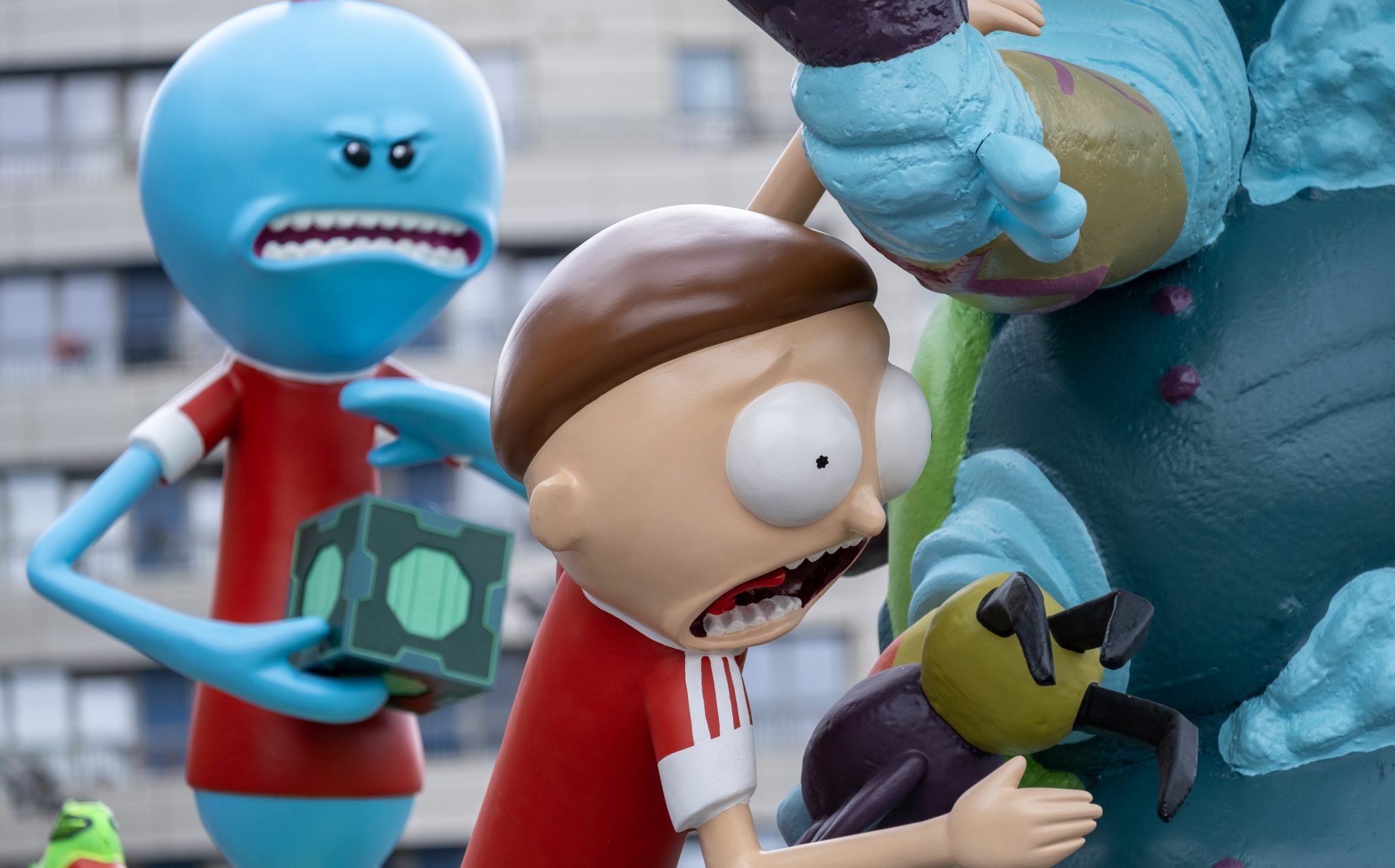 A close-up of 2 Rick and Morty characters looking shocked